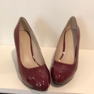 Burgundy patent leather pumps